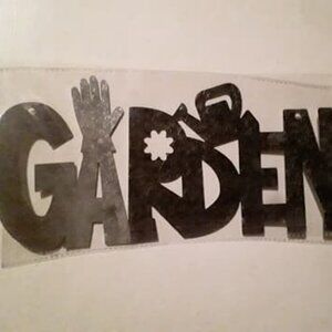 galvanized metal "GARDEN" sign, feat cutouts of a hand, watering can, & a flower